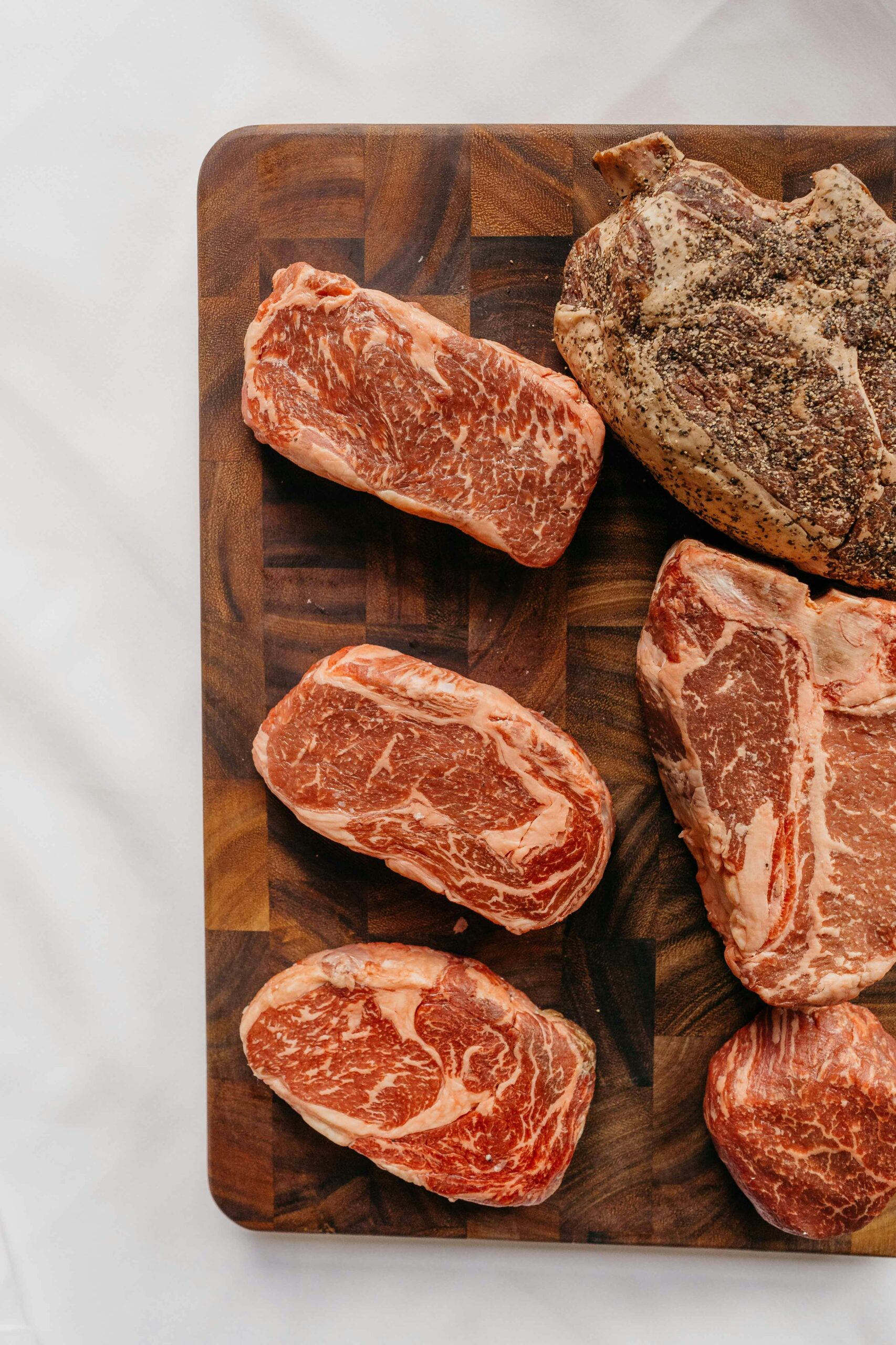 Cuts of beef on a wooden board